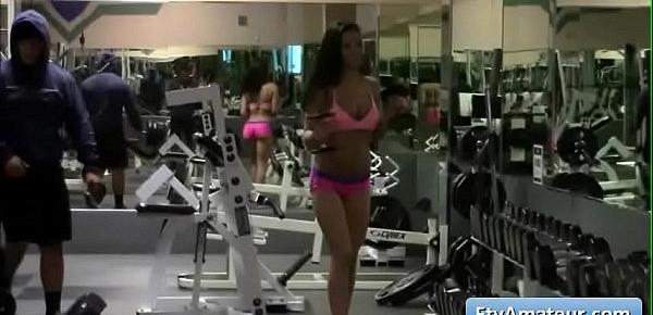  Hot brunette teen Lana flashing her nice big round boobs at the gym